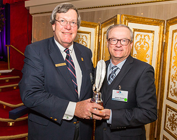 William E. Fallon, a member of the USGA Executive Committee presents James R. Hansen, right, with the Herbert Warren Wind Book Award. (Copyright USGA/Chris Keane)