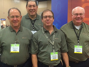 The crew at the AMVAC booth this year included (from left) John Boltin, Dean May, John Bruce and Rennie Kubik.