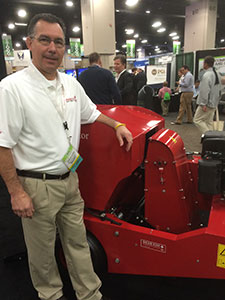 Redexim Regional Sales Manager Daryn Clark shows off the new Core Collector introduced at this year's GIS.