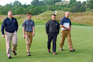 (L to R) Lee, Second Assistant Derek Loda, Zugel and  Sell do a walk-through of the course late last month.