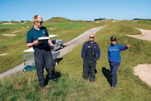 Shaun Brill tracks irrigation heads with the help of Sell and Zugel. "We've been really lucky with weather so far this year," Zugel says.