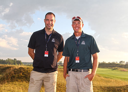 John Reid, assistant greenkeeper of The Duke's, St. Andrews, and Ryan Lindsley, Staits Course assistant-in-training, take time for a photo. (And thanks to Lindsley for valeting my Dodge Charger when I got to the course... but was that burn-out really necessary? Oh well, it's a rental.)