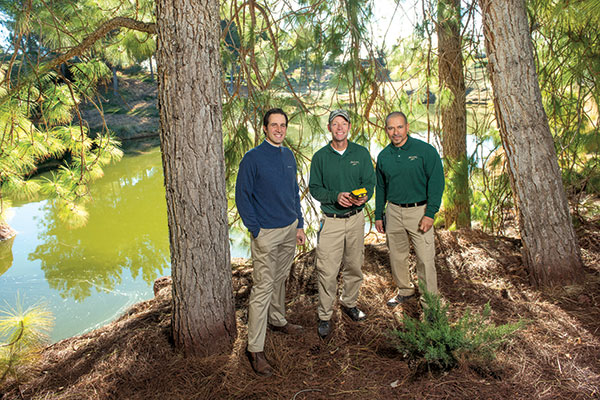 Cloninger with Brad Harper, who did much of the fieldwork mapping fairways using a Trimble Geo Explorer XH 6000 (in hands) and Carlos Duran, who navigated the drip irrigation project. 