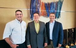 Craig MacGregor (left) and Bill Roddy (right) with Primera CEO Todd Ferguson.