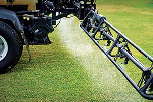 Close-up golf course spray application (Photo: PBI-Gordon)