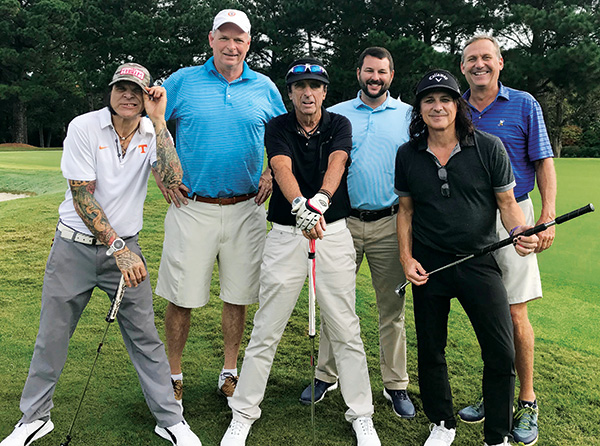 Kyle Johnson and team pose with Alice Cooper and band (Photo: Ted Kiegiel)