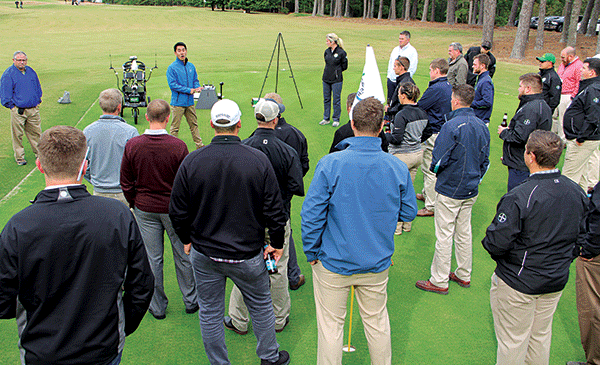 Chenxi Zhang speaking to group of Green Start attendees (Photo: Seth Jones)