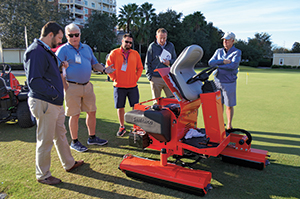 Smithco team showing off greens rollers (Photo: Kelly Limpert)