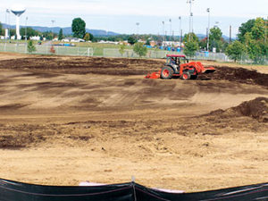 Compost being tilled into soil using a rototiller. (Photo: Pete Landschoot)