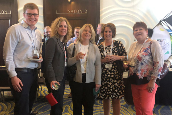 Pictured from left at the welcome reception are Kevin Finnegan, FMC Corp.; Jill Holihan, FMC Corp.; Ona Maune, Bayer; Carrie Tackema, Nufarm Americas; and Julie Schlekau, Valent. Photo: RISE