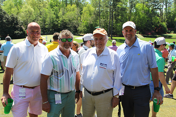 Left to right: Rich Sweeney, Plant Food Co.; Ricky Reeves, superintendent, Miami Beach GC; Robert Trent Jones II, ASGCA; and Nate Watkin, superintendent at Seagate CC, Delray Beach, Fla., smile for a photo together on Amen Corner at Augusta National. (Photo: Seth Jones)