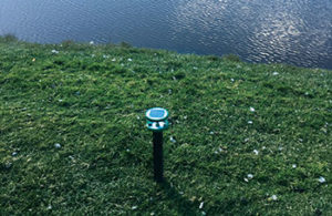 In many cases, land-based flashers can be placed on top of hazard stakes that surround ponds. (Photo: Ruth Lake CC)