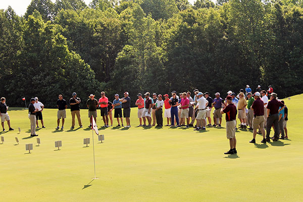 Turfgrass professors set up displays of different turfgrasses and diseases on the fairways and greens of Independence Golf Club. (Photo: Virginia Golf Course Superintendents Association)