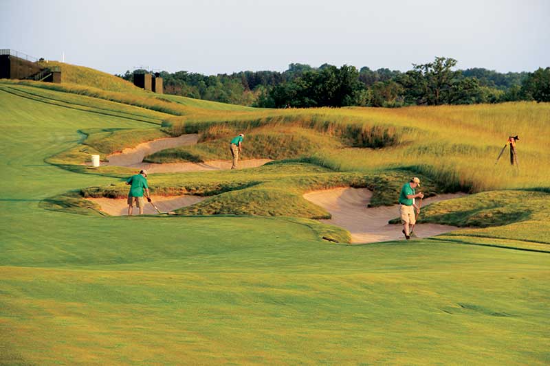 Crews prepare Erin Hills’ bunkers during the 2017 U.S. Open. (Photo: Golfdom staff)