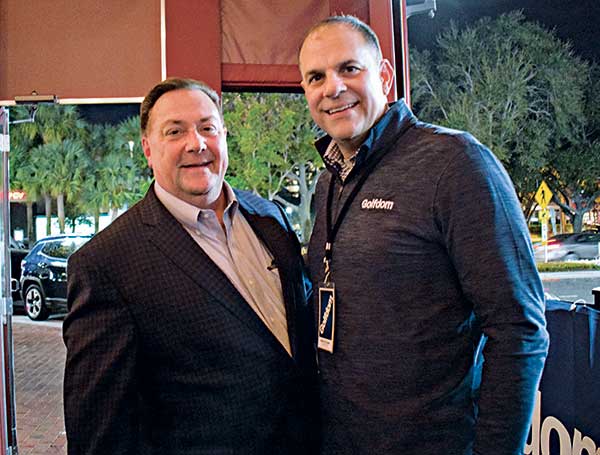 Curtis Clark, executive vice president of Control Solutions (parent company of Quali-Pro), with North Coast Media President and CEO Kevin Stoltman. (Photo: Golfdom Staff)