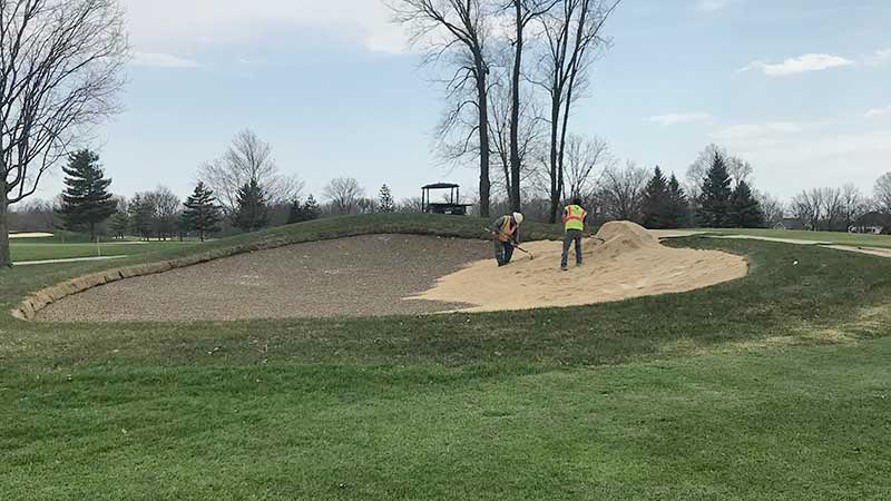 Chase Walden, superintendent of of Old Oakland Golf Club in Indianapolis, Ind., says if you opt for an outside contractor to work on your bunkers, expect to work long hours as the crew wants to complete the job as quick as they can. (Photo: Chase Walden)