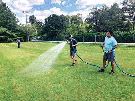 David McCall’s students conduct a postapplication study with wetting agents for control of spring dead spot. (Photo: David McCall)