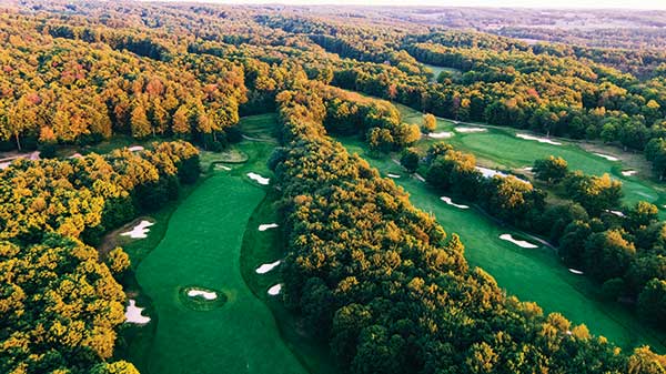 An aerial view of the Signature Course. No. 3 is located back right, No. 5 is located in the middle and No. 6 is located on the left side. Rick Smith designed the course after a trip overseas to Scotland and Ireland. It has 135 bunkers. (Photo: Treetops Resort)