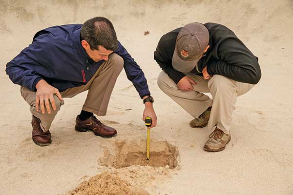 Evaluating bunkers (Photo courtesy of the USGA)