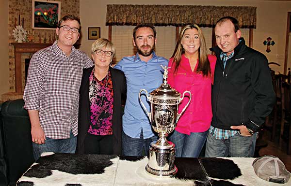 Patrick, Kay, Andrew, Carly and Travis with the U.S. Open trophy when Jim Moore was in charge of bringing the trophy to the Golf Industry Show. (Photo: The Moore family)