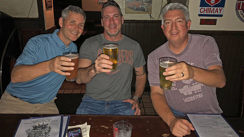 Group Publisher Bill Roddy (left) Craig MacGregor (center) and Jones celebrate the end of a long business trip at a dive bar in Philadelphia. (Photo: Golfdom Staff)