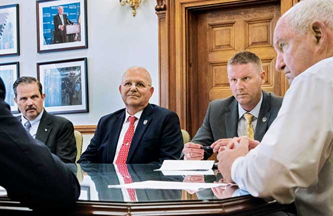 “It’s nice to know the people you were working for all those years are appreciative of the work,” said Mike Kenna (center) on winning the 2021 Col. Morley DSA Award. (Photo courtesy of Mike Kenna)