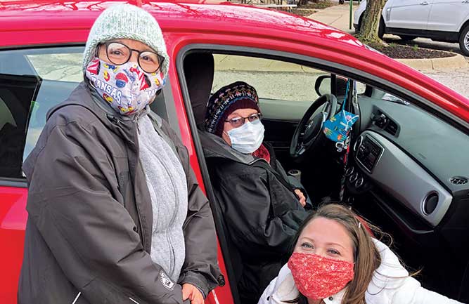 The Jones-Romero family smiles after getting 94-year-old Virginia (center) her vaccine. (Photo courtesy of Golfdom Staff)