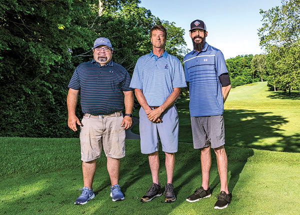 Burke and Ferone with assistant superintendent Bob Herr (left.) “There are hundreds of guys in the industry like Bob, who are so dedicated and deserve to be in a magazine more than me,” Ferone says. (Photo: Matthew Allen)