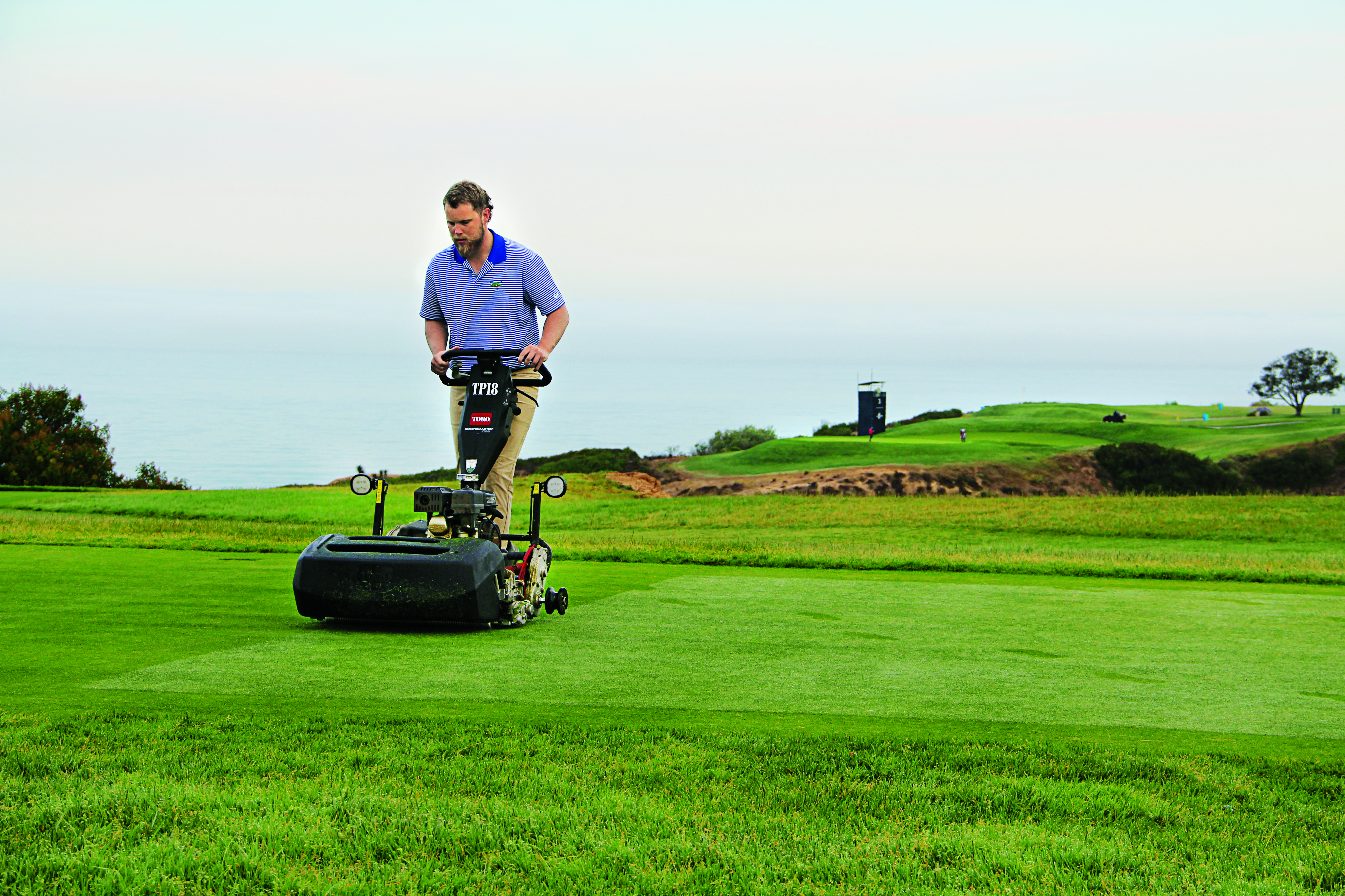 Jake Ogren, University of Tennessee student currently interning at Valhalla Golf Club, Louisville, Ky., mows a teebox. (Photo: Golfdom Staff)