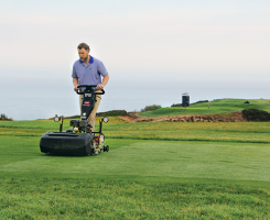 Jake Ogren, University of Tennessee student currently interning at Valhalla Golf Club, Louisville, Ky., mows a teebox. (Photo: Golfdom Staff)