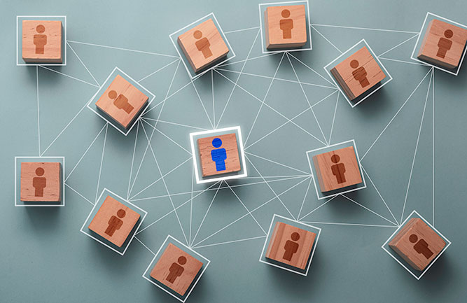 Blocks depicting people interconnected (Photo: Dilok Klaisataporn / iStock / Getty Images / Getty Images Plus)