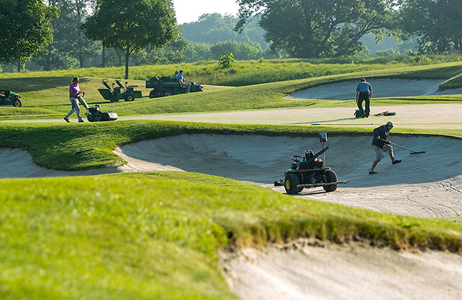 Crew hard at work preparing TPC Deere Run for the tournament. (Photo courtesy of John Deere)