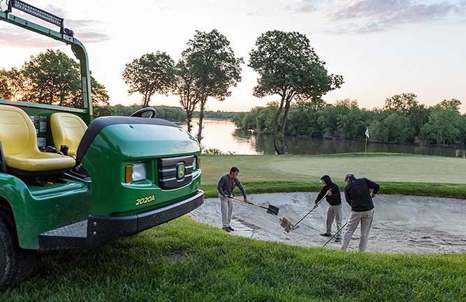 Crews at TPC Deere Run preparing the bunkers. (Photo courtesy of John Deere)