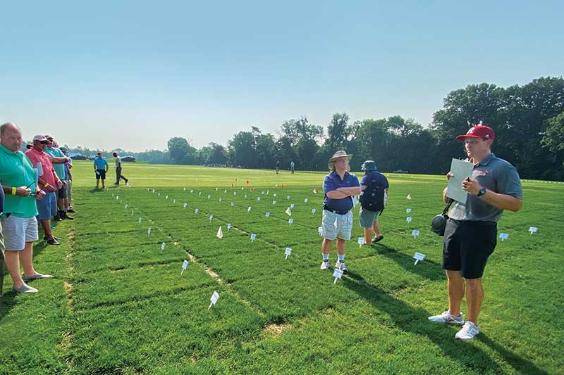 Phillip Vines, Ph.D., discusses developing gray leaf spot resistance in perennial ryegrasses at the 2021 Rutgers Turfgrass Field Day. (Photo: Mike Kenna)