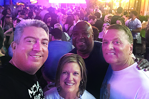 Golfdom Editor-in-Chief Seth Jones (left) was happy to not only get out to enjoy a concert, but also to make some new friends in the industry by meeting PBI-Gordon’s Brett Rieck (right) at the concert (with wife, Dana and Seth’s friend Sean Lipford in back). (Photo: Golfdom Staff)