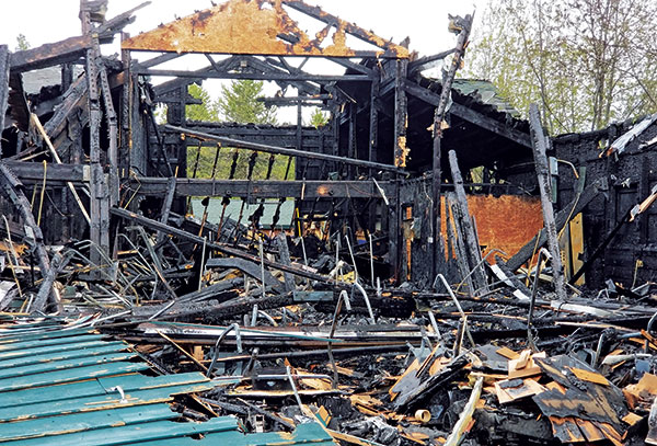 Rick Mooney took a phone call during a company retreat to discover Shore Lodge | Whitetail Club’s cart barn was on fire. (Photo: Rick Mooney)