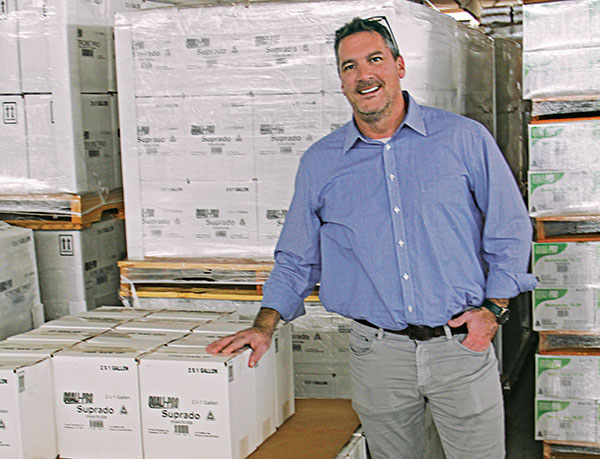 Golfdom Publisher Craig MacGregor with Suprado crates (Photo: Golfdom Staff)