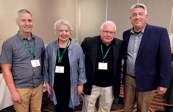 Golfdom Group Publisher Bill Roddy (left) and Editor-in-Chief Seth Jones (right) attended the ceremony along with Hiscock’s wife, Pat. (Photo: Golfdom Staff)