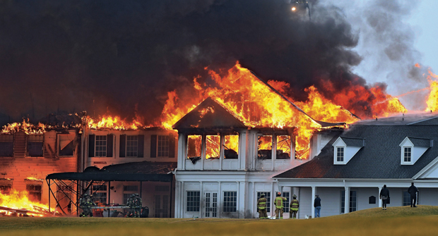 The cause of the fire that resulted in the complete loss of the structure may never be known. (Photo: Daniel Mears /Detroit News via AP (fire)