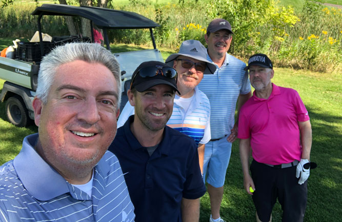 (Left to right) Seth Jones with Rush Creek Superintendent Matt Cavanaugh, Ande Parks, Turfco Executive Vice President Scott Kinkead and Pete Krause. (Photo: Golfdom Staff)