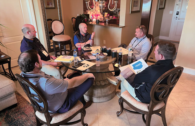 2022 Herb Graffis Businessperson Award winner Alex Stuedemann, CGCS (top right) and Alex Beson-Crone (right) meet with the team from Quali-Pro. (Photo: Golfdom Staff)