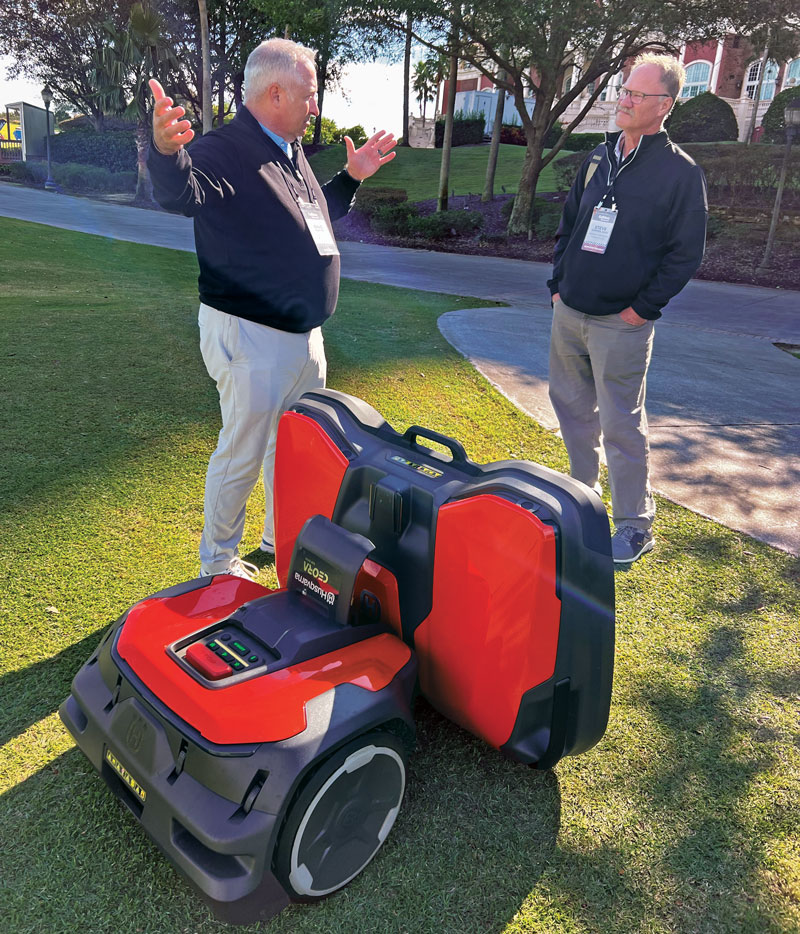 Dave Plaster, director of business and golf for Husqvarna, shares with Steve Gonyea how Automowers offer a look into the future. (Photo: Golfdom Staff)