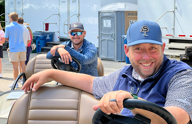 TPC Deere Run Superintendent Jonathan Graham (right) surveys the grounds with Assistant Superintendent Jarrett Chapman. (Photo Golfdom Staff)