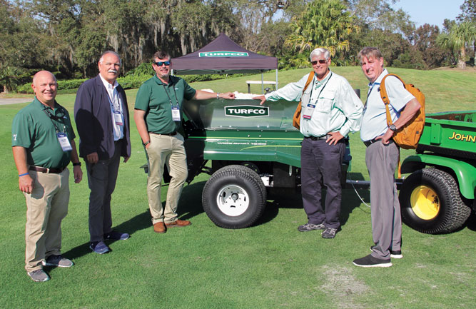 (Left to right) Brian Godwin, Turfco; Bob Farren, CGCS; Scott Kinkead, Turfco; Matt Shaffer and Shawn Emerson pause from the Turfco demonstration for a photo at the 2022 Golfdom Summit. (Photo: Golfdom Staff)