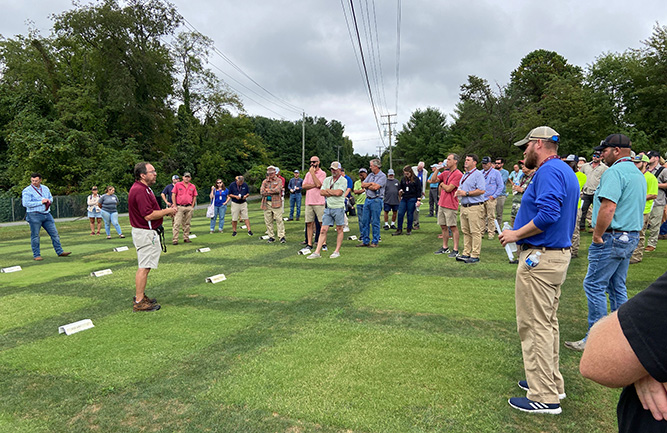 Mike Goatley shows the 2023 Field Day crowd the 2019 National Turfgrass Evaluation Program bermudagrass variety trial. (Photo courtesy of Mike Goatley)