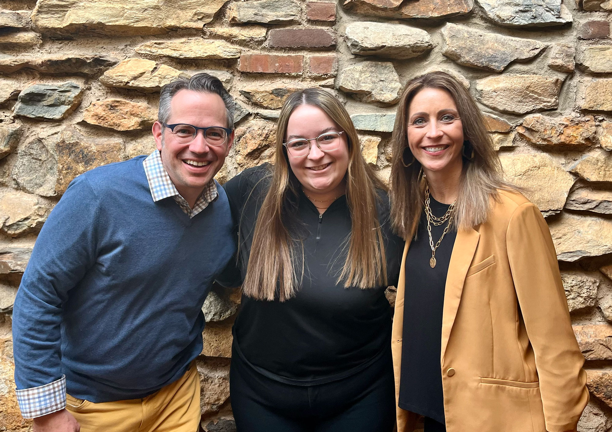 Photo:(From left to right) Mark LeFleur, communications lead for turf and landscape at Syngenta, Sydney Fischer, digital editor for Golfdom and Stephanie Schwenke, marketing manager at Sygenta, catch up at SBI. (Photo: Golfdom staff)