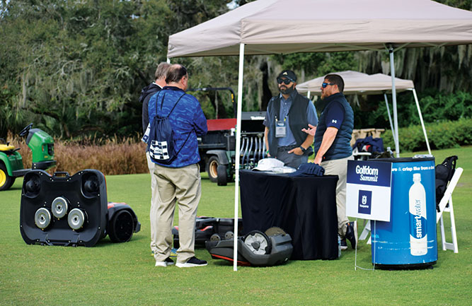 Attendees got up close with Husqvarna’s Automowers and saw them work on an area of Reunion Resort’s driving range. (Photo: Golfdom Staff)