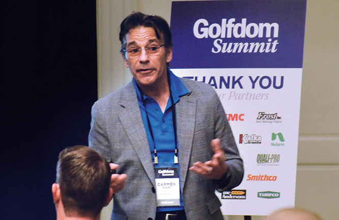 Carmen Magro, CGCS, Ph.D., vice president of POGO Turf Pro, addresses the entire group during his boardroom presentation. (Photo: Golfdom Staff)