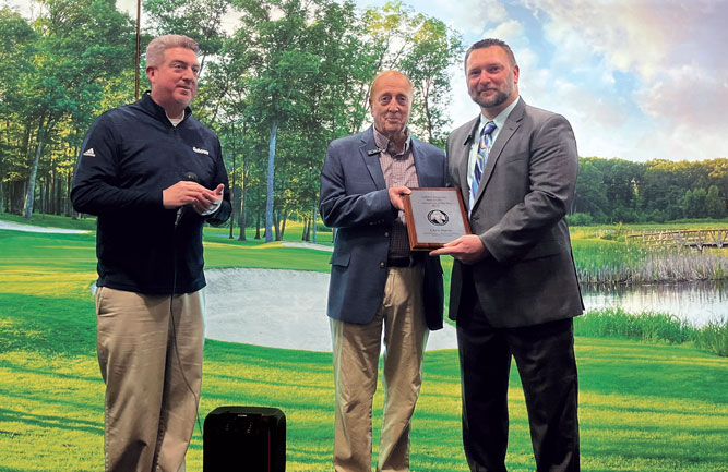 It was all smiles at the Golfdom booth as Chris Navin received his Herb Graffis Businessperson of the Year award at the 2024 GCSAA Show. (Photo: Golfdom staff)