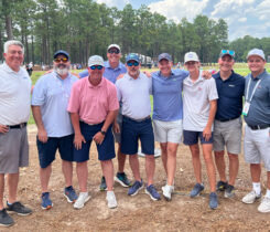 From left to right: Golfdom EIC Seth Jones, Scott Waltz, Aaron Wells and Mark Semm, all reps for BASF, with Steve Harris, Invited Golf and Brian Thompson, BASF and his son, Brendan, with Bill and Connor Roddy, checking out the action at the U.S. Open during Wednesday’s practice round. (Photo: Golfdom staff)
